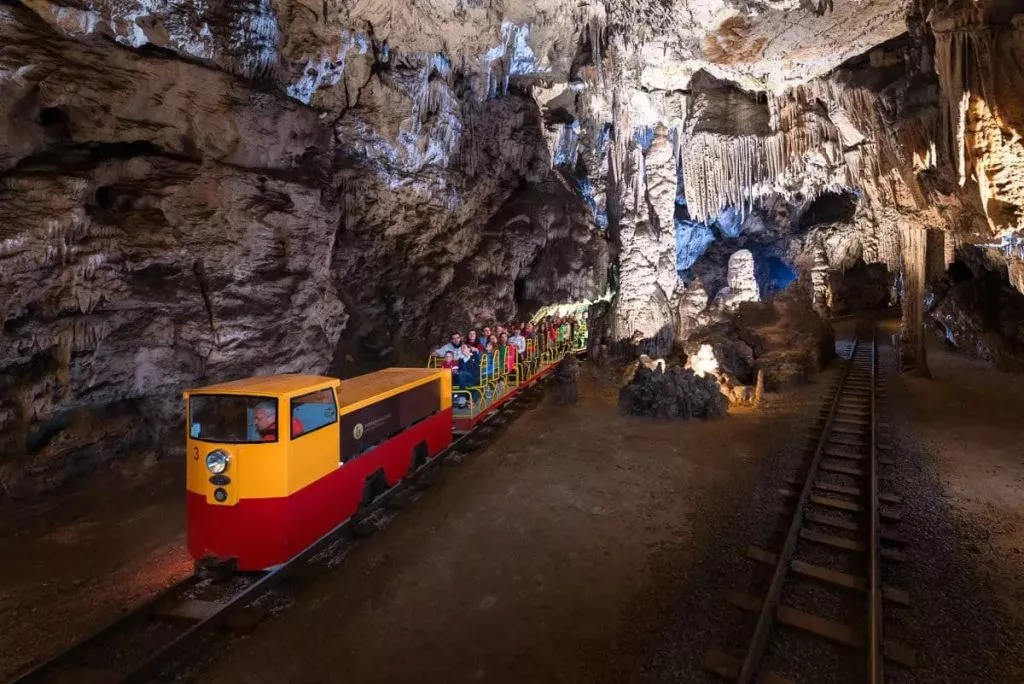 train in postojna cave